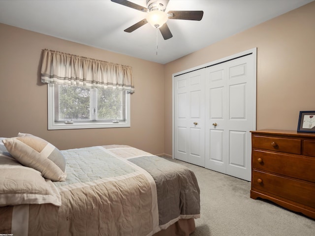 1008 Hidden Ln, Rochester Hills, MI 48309 - bedroom featuring light carpet, a closet, and ceiling fan