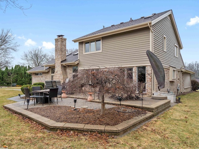 1008 Hidden Ln, Rochester Hills, MI 48309 - rear view of house with a patio, a yard, and brick siding