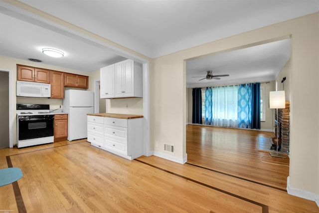 23716 Roxana Ave, Eastpointe, MI 48021 - kitchen featuring white appliances, light wood-style flooring, a ceiling fan, and white cabinetry