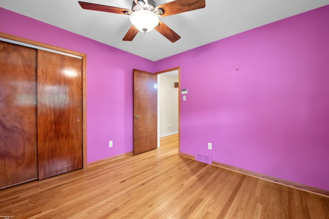 23716 Roxana Ave, Eastpointe, MI 48021 - unfurnished bedroom with wood finished floors, a closet, and a ceiling fan