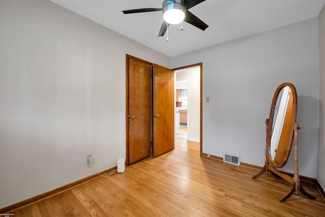 23716 Roxana Ave, Eastpointe, MI 48021 - unfurnished bedroom featuring light wood-style floors and a ceiling fan