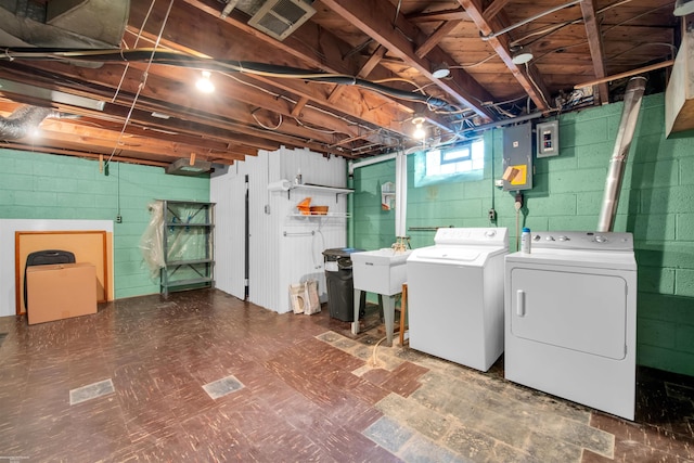 23716 Roxana Ave, Eastpointe, MI 48021 - below grade area with washer and dryer, tile patterned floors, and electric panel