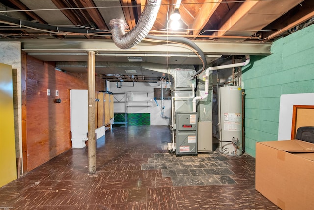 23716 Roxana Ave, Eastpointe, MI 48021 - unfinished below grade area featuring water heater, tile patterned floors, heating unit, and concrete block wall