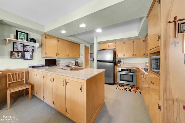 528 Hidden Ln, Grosse Pointe Woods, MI 48236 - kitchen featuring stainless steel appliances, a peninsula, light brown cabinets, light countertops, and recessed lighting