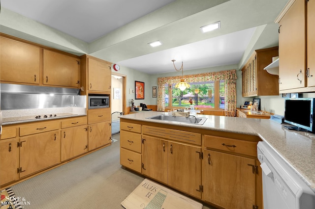 528 Hidden Ln, Grosse Pointe Woods, MI 48236 - kitchen with a peninsula, stainless steel microwave, dishwasher, light countertops, and hanging light fixtures