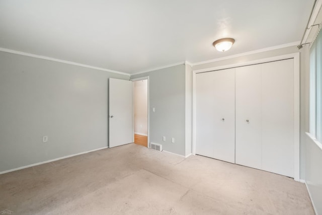 6575 Goldfinch Ln, Clarkston, MI 48346 - unfurnished bedroom with carpet, crown molding, and a closet