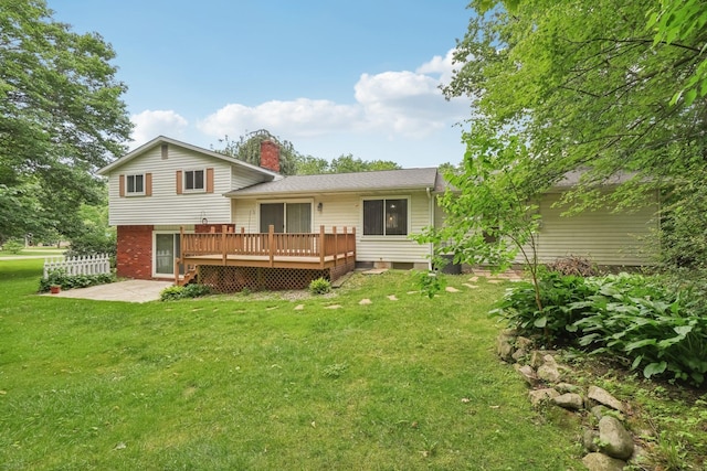 6575 Goldfinch Ln, Clarkston, MI 48346 - back of house with a wooden deck, a yard, a chimney, and a patio