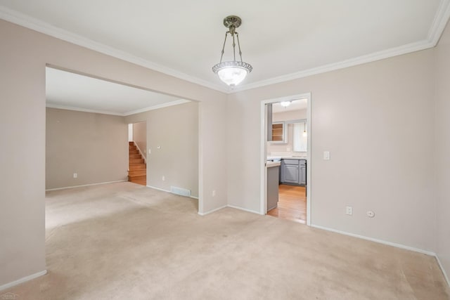 6575 Goldfinch Ln, Clarkston, MI 48346 - spare room with stairway, light carpet, and crown molding