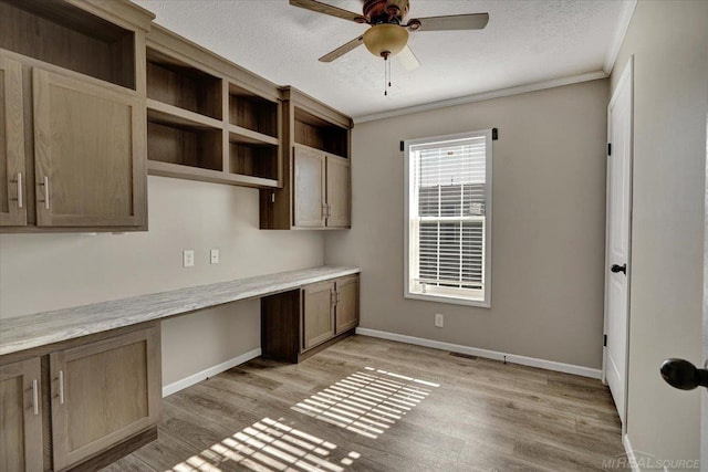 260 Meadow Ln, Port Huron, MI 48060 - kitchen with built in study area, a ceiling fan, light wood-style flooring, open shelves, and crown molding