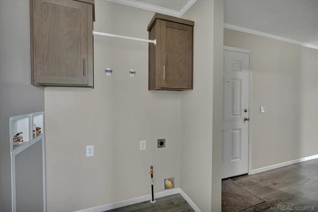 260 Meadow Ln, Port Huron, MI 48060 - laundry area featuring hookup for an electric dryer, cabinet space, wood finished floors, crown molding, and washer hookup