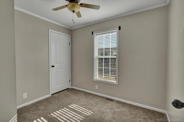 260 Meadow Ln, Port Huron, MI 48060 - spare room featuring carpet floors, a ceiling fan, and crown molding