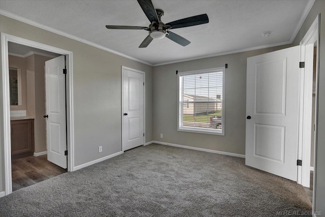 260 Meadow Ln, Port Huron, MI 48060 - unfurnished bedroom featuring carpet floors, a textured ceiling, ornamental molding, ensuite bathroom, and a ceiling fan