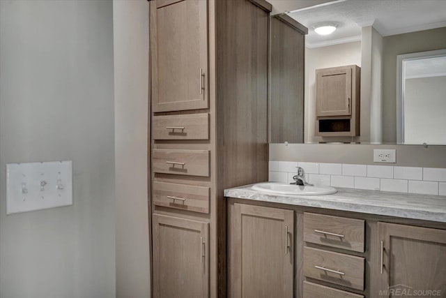 260 Meadow Ln, Port Huron, MI 48060 - bathroom featuring vanity, ornamental molding, and backsplash