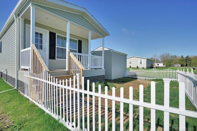 260 Meadow Ln, Port Huron, MI 48060 - manufactured / mobile home featuring covered porch