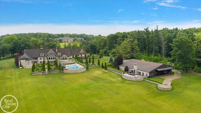 5350 Brewster Rd, Oakland Twp, MI 48306 - aerial view of property and surrounding area with a forest and a pool