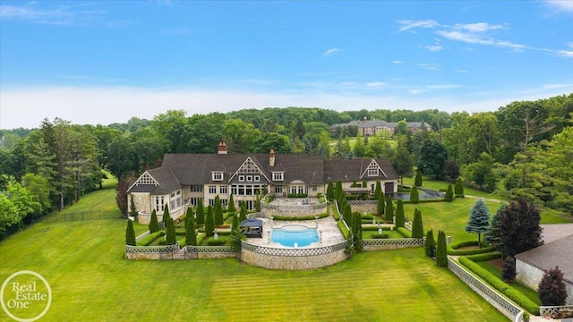 5350 Brewster Rd, Oakland Twp, MI 48306 - aerial view of property and surrounding area with a pool and a forest