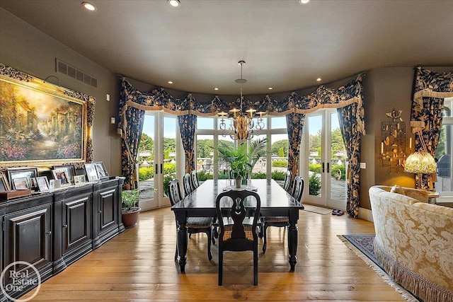 5350 Brewster Rd, Oakland Twp, MI 48306 - dining room with french doors, a chandelier, light wood-style flooring, and recessed lighting