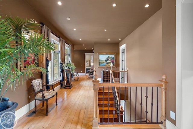 5350 Brewster Rd, Oakland Twp, MI 48306 - hall with an upstairs landing, recessed lighting, and light wood-style flooring