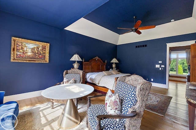 5350 Brewster Rd, Oakland Twp, MI 48306 - bedroom featuring wood finished floors, lofted ceiling, and ceiling fan