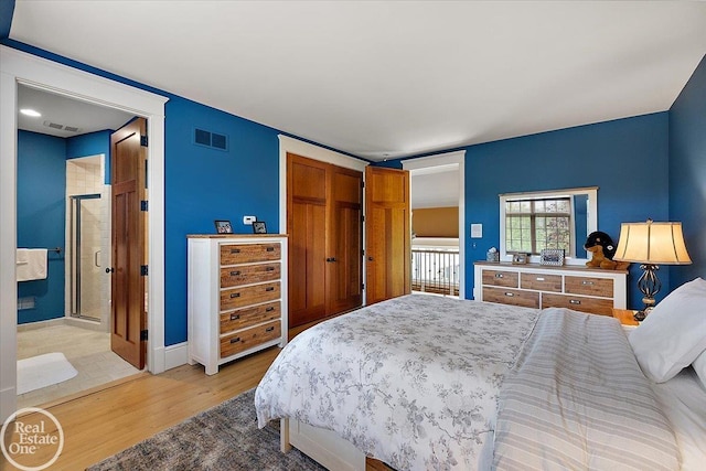 5350 Brewster Rd, Oakland Twp, MI 48306 - bedroom with light wood-style floors and a closet