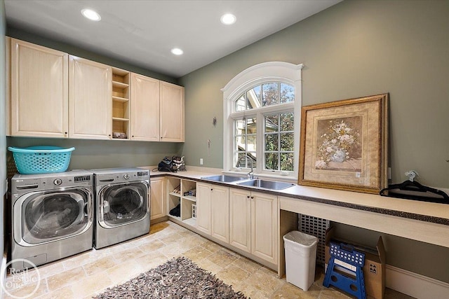5350 Brewster Rd, Oakland Twp, MI 48306 - washroom with cabinet space, washing machine and dryer, light stone finish floors, and recessed lighting