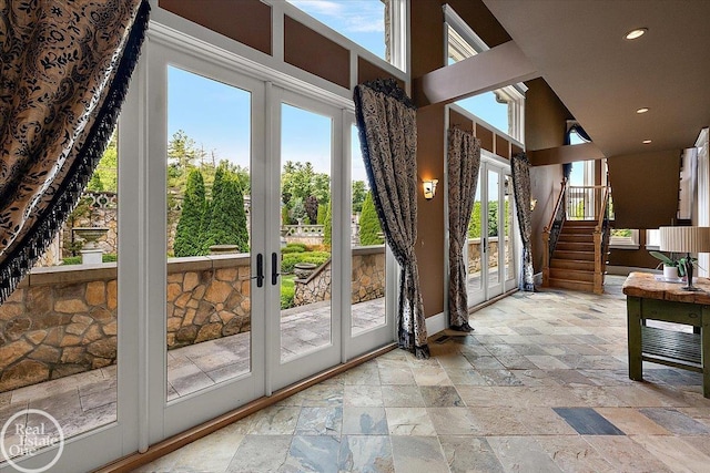 5350 Brewster Rd, Oakland Twp, MI 48306 - entryway with stone tile flooring, french doors, stairs, recessed lighting, and a towering ceiling