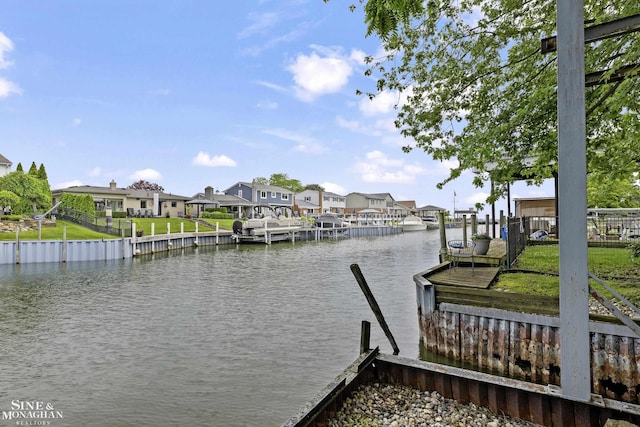 22565 Ardmore Park Dr, Saint Clair Shores, MI 48081 - dock area featuring a residential view and a water view