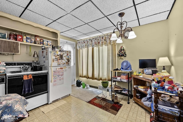 22565 Ardmore Park Dr, Saint Clair Shores, MI 48081 - kitchen with electric range, freestanding refrigerator, tile patterned floors, a drop ceiling, and a chandelier