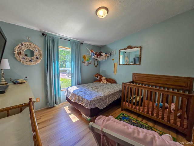 N6974 Tahquamenon Dr, Munising, MI 49862 - bedroom with wood finished floors