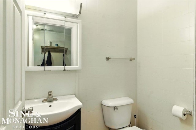 3032 24th St, Port Huron, MI 48060 - half bathroom with vanity and toilet