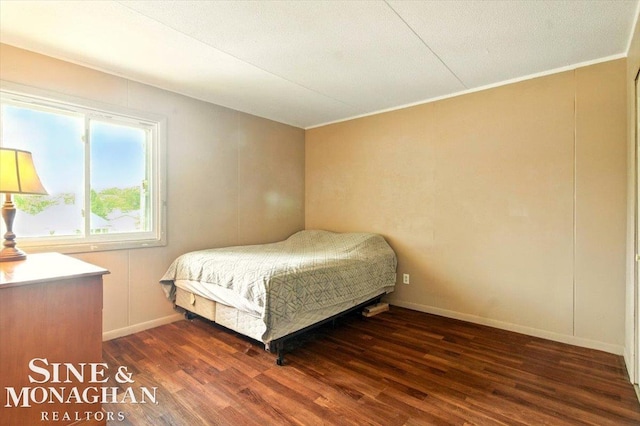 3032 24th St, Port Huron, MI 48060 - bedroom with wood finished floors and crown molding
