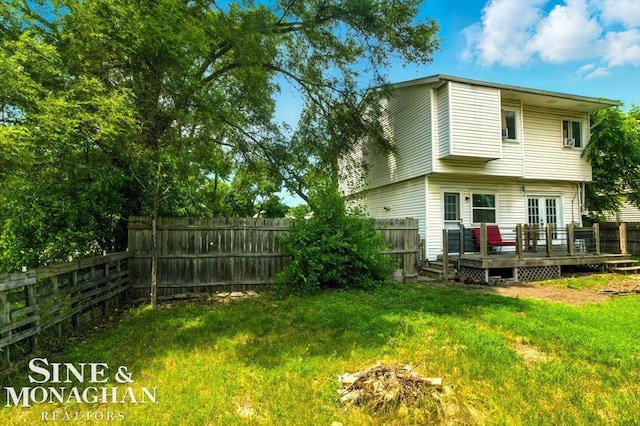 3032 24th St, Port Huron, MI 48060 - rear view of property with a wooden deck and a fenced backyard