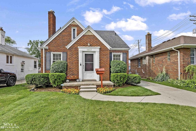 1857 Roslyn Rd, Grosse Pointe Woods, MI 48236 - bungalow-style home with brick siding, a front yard, and a chimney