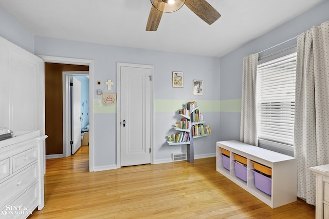 1857 Roslyn Rd, Grosse Pointe Woods, MI 48236 - rec room with a ceiling fan and light wood-style floors