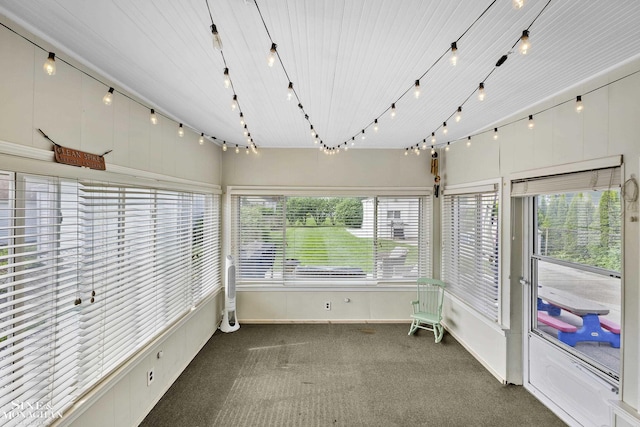 1857 Roslyn Rd, Grosse Pointe Woods, MI 48236 - unfurnished sunroom featuring carpet and baseboards