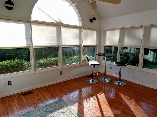 2308 S River Rd, Beaverton, MI 48612 - unfurnished sunroom featuring hardwood / wood-style floors and lofted ceiling