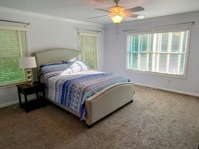 2308 S River Rd, Beaverton, MI 48612 - bedroom with ornamental molding, carpet flooring, and a ceiling fan