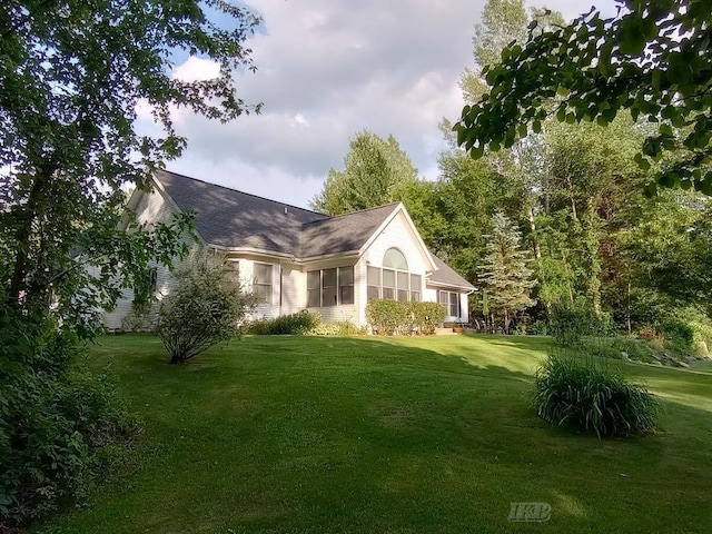 2308 S River Rd, Beaverton, MI 48612 - back of property with a yard and a shingled roof