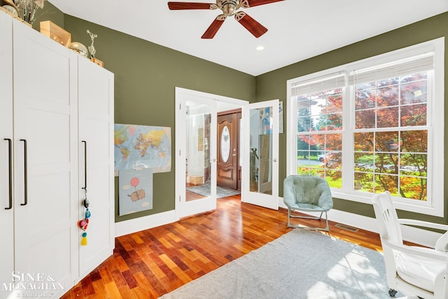 3325 Saint Andrews Dr, Port Huron, MI 48060 - living area with french doors, wood finished floors, a ceiling fan, and recessed lighting