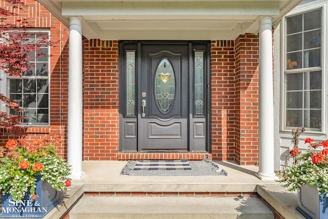 3325 Saint Andrews Dr, Port Huron, MI 48060 - property entrance featuring brick siding and a porch