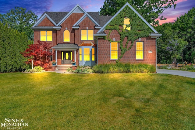 3325 Saint Andrews Dr, Port Huron, MI 48060 - view of front of home with a yard and brick siding