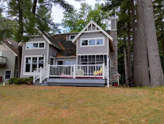 11374 S Shore Dr, Lake, MI 48632 - back of house featuring a chimney, a deck, and a yard