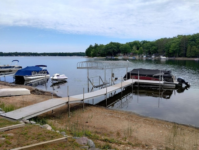11374 S Shore Dr, Lake, MI 48632 - dock area with a water view and a wooded view