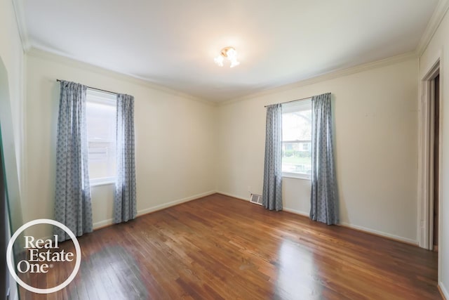 491 Bournemouth Rd, Grosse Pointe Farms, MI 48236 - empty room featuring ornamental molding and wood finished floors