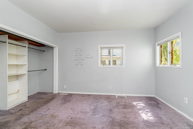 413 N Oakley St, Saginaw, MI 48602 - unfurnished bedroom featuring carpet floors