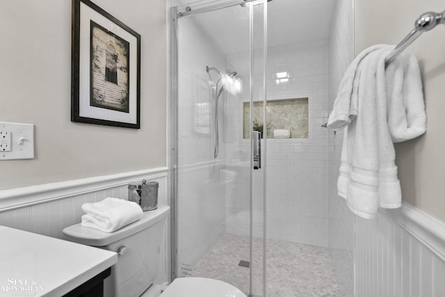 488 University Pl, Grosse Pointe, MI 48230 - bathroom featuring a wainscoted wall, a shower stall, and vanity