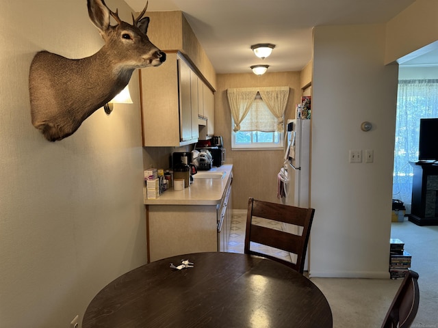 34500 Mulvey Rd, Fraser, MI 48026 - dining room featuring light carpet and baseboards