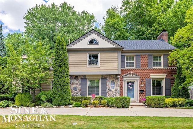28 Hampton Rd, Grosse Pointe Shores, MI 48236 - view of front of home featuring a chimney and stone siding