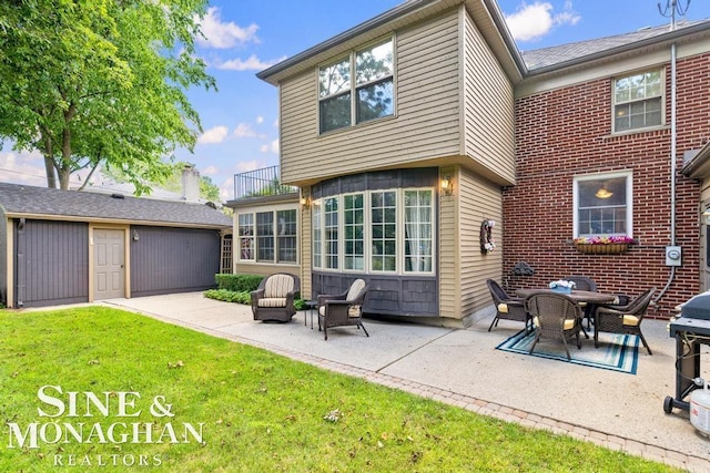 28 Hampton Rd, Grosse Pointe Shores, MI 48236 - rear view of house with a patio, a lawn, and a balcony