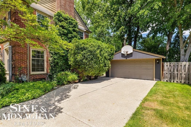 28 Hampton Rd, Grosse Pointe Shores, MI 48236 - view of front of home with an outdoor structure, a garage, and brick siding